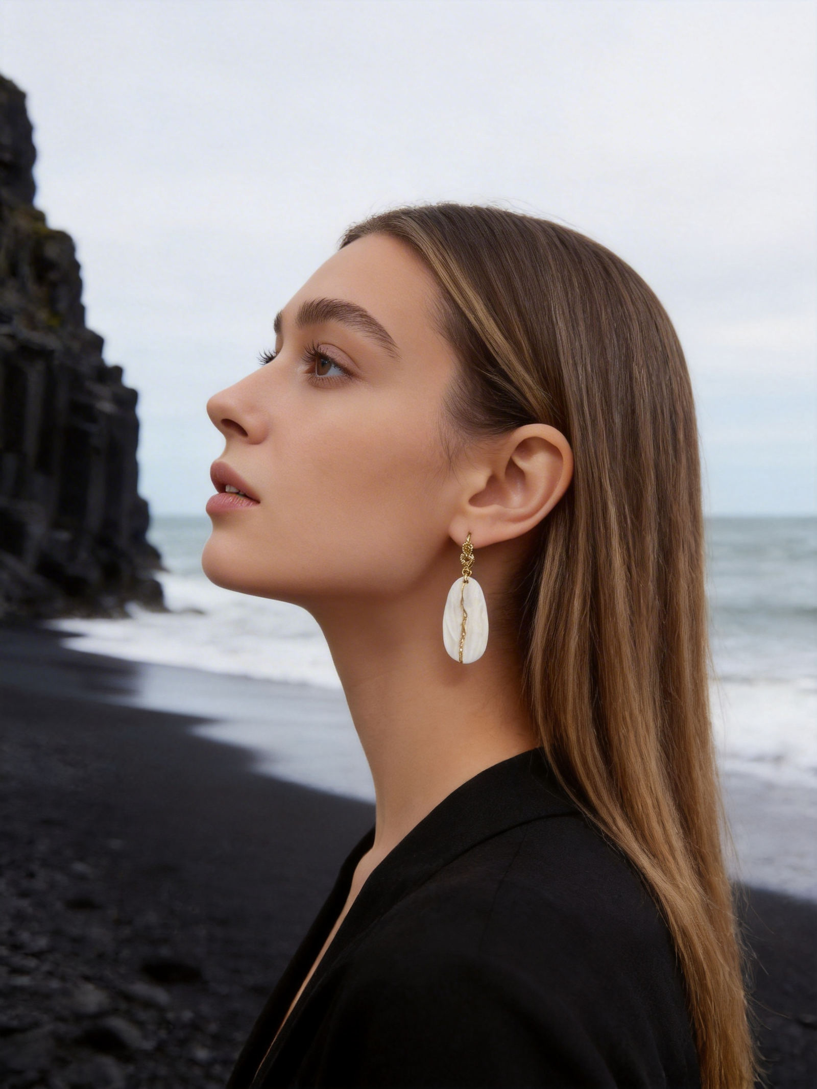 handmade porcelain jewelry by ZELIN ART worn by model
